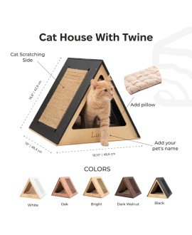 A wooden cat house A wooden cat house